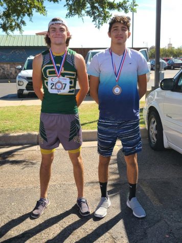 Wolverine medalists from the Mae Simmons cross country meet. (Seniors Trace Goodman and Josh Samaron).