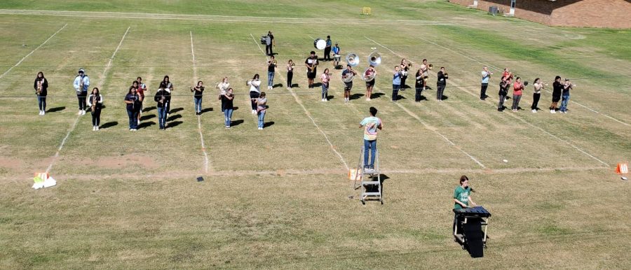 Wolverine band practicing new drill.