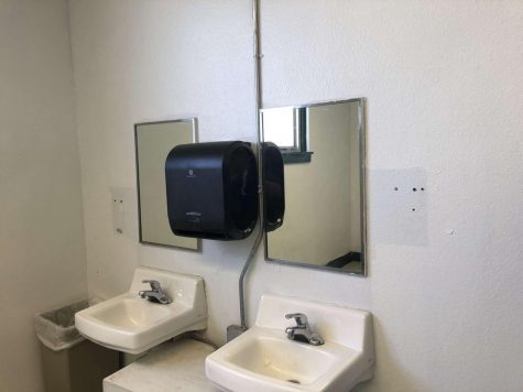 Missing soap dispensers in boys bathroom 