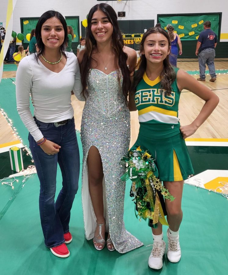 Sophomore Aryca Ibarra with junior DD Delgado (left) and freshman Aabriella Villanueva (right).