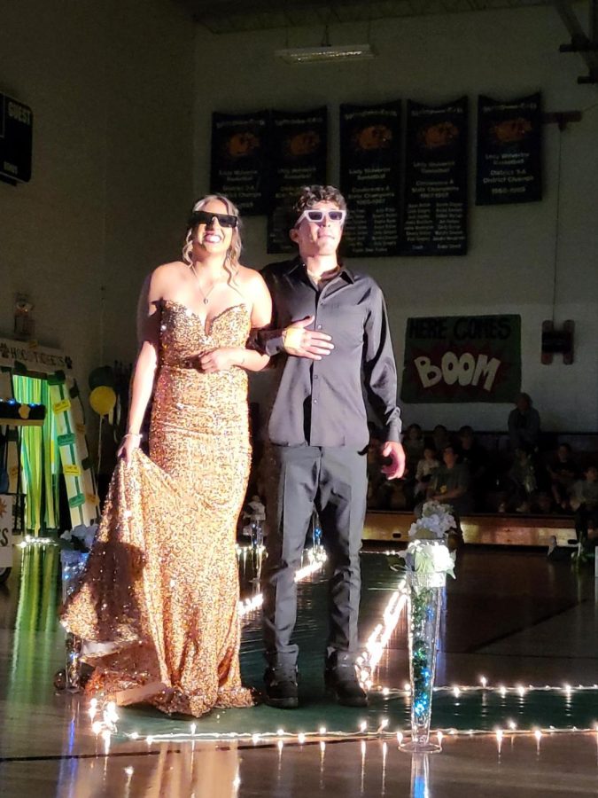 Seniors Halee Toscano and Jerry Gallegos rocking shades as they walked together at the homecoming pep rally.