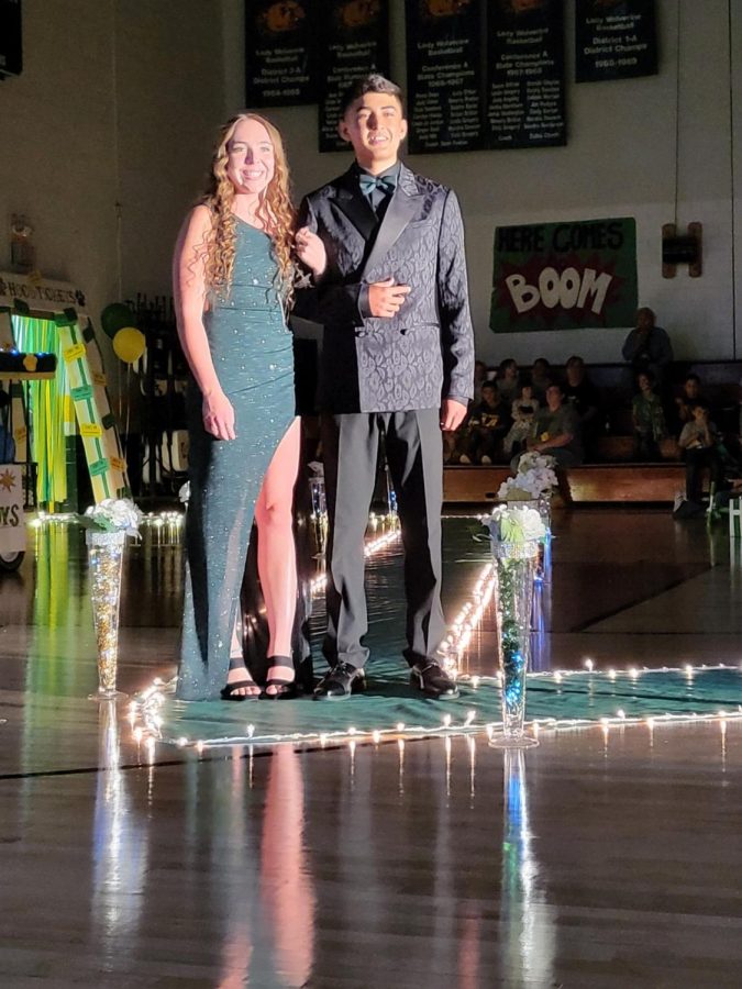 Juniors Sydney Furr and JJ Jaramillo walking together at the homecoming pep rally.
