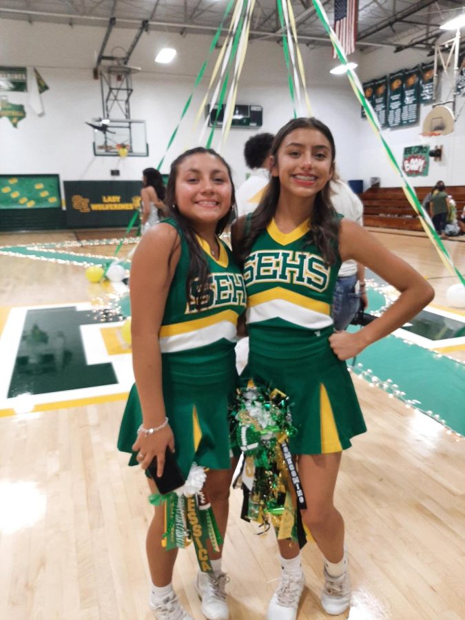 Freshmen Aabriella Villanueva and Jessica Mendoza posing together after the homecoming pep rally. 