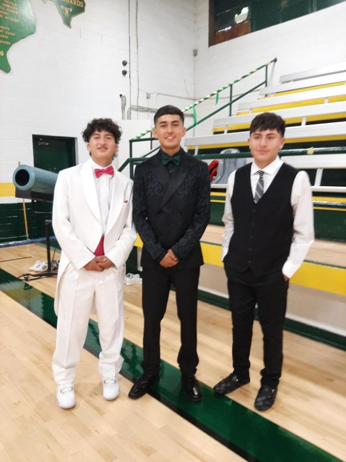 The freshman homecoming candidate, Froylan Agundiz, the sophomore candidate, Timothy Tovar, and the junior candidate, JJ Jaramillo posing together.