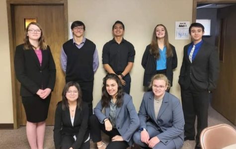 Freshmen Lexi Anchondo and Lizzy Garcia, sophomores Tyler Tanaro and Nehemiah Castillo, juniors Lynnsey Mahler and Emma Stevenson, and seniors Annabelle Anchondo and Oscar Flores all getting ready to debate at district.