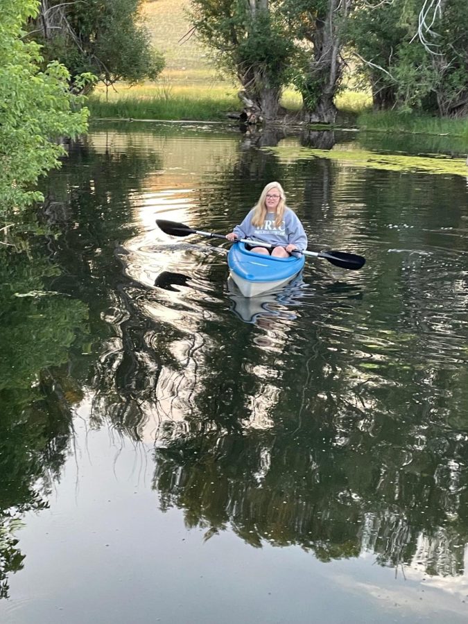Emma kayaking in Wyoming. Emma loves the outdoors and nature. 